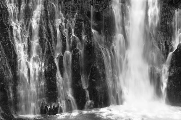 Close up of waterfall in black and white, MacArthur Burney Falls in black and white, California, USA MacArthur Burney Falls in black and white, California, USA burney falls stock pictures, royalty-free photos & images