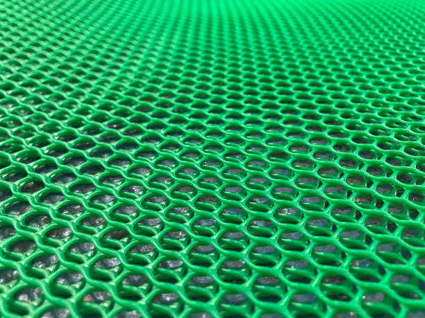 istock Background mesh hole plastic fibre that is green 1038033014