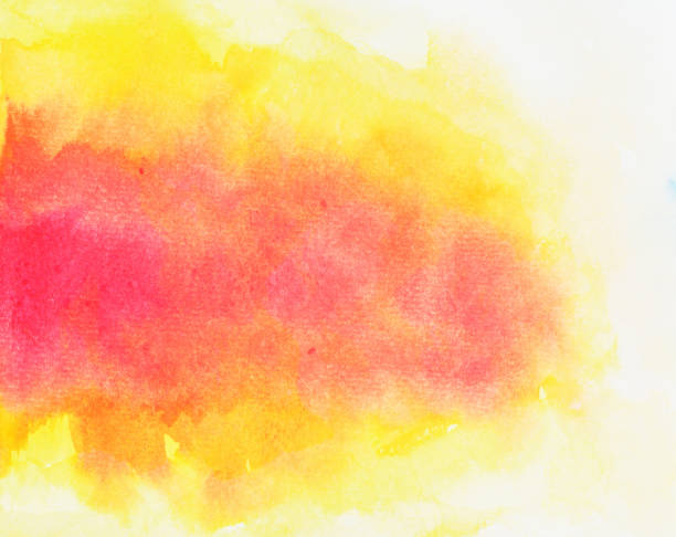 istock Red and orange color stain on yellow surface on white background 1038033386
