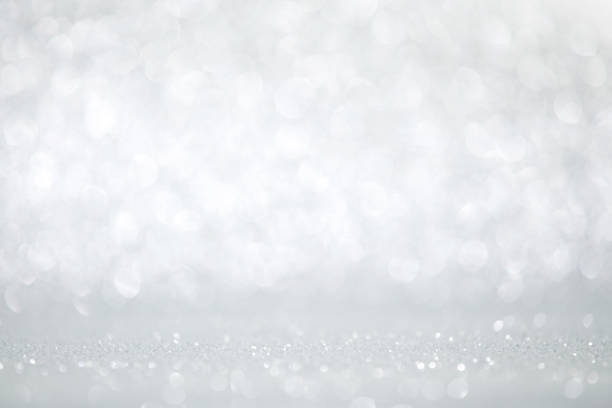 istock Glittery shiny lights silver abstract Christmas background 1038050160
