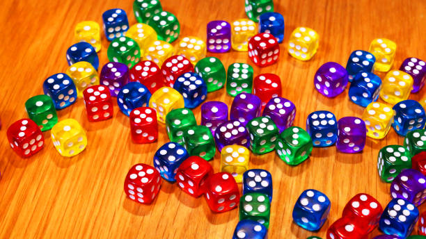 istock Colorful of dices on the wood table. 1038080832