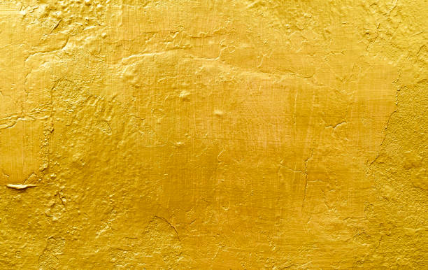 istock Gold background or textures and shadows, old walls and scratches 1038080850