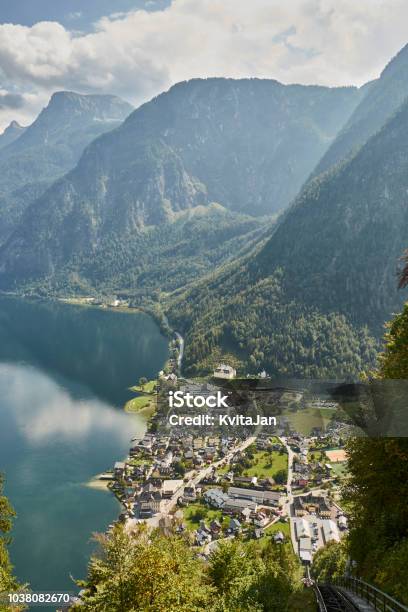 Scenic View Of A Landscape With Mountains Above Halstatt Village In Austria Stock Photo - Download Image Now