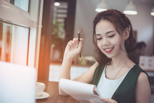 istock Confident happiness young woman working on laptop or notebook in her office. 1038096618