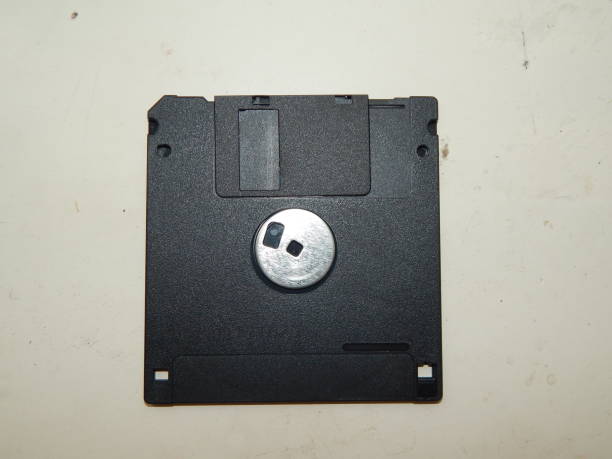 istock Information carriers for computer technology disks and floppy disks 1038133008