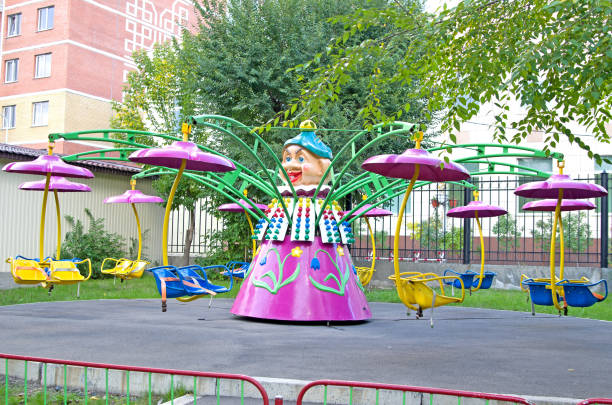 istock Children's revolving carousel in the park. 1038140032