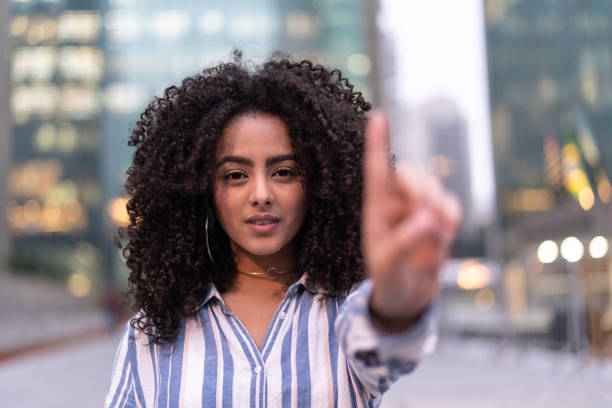 istock Confident Businesswoman showing number 1 1038145514