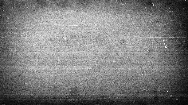 Photo of Noisy film frame with heavy scratches, dust and grain
