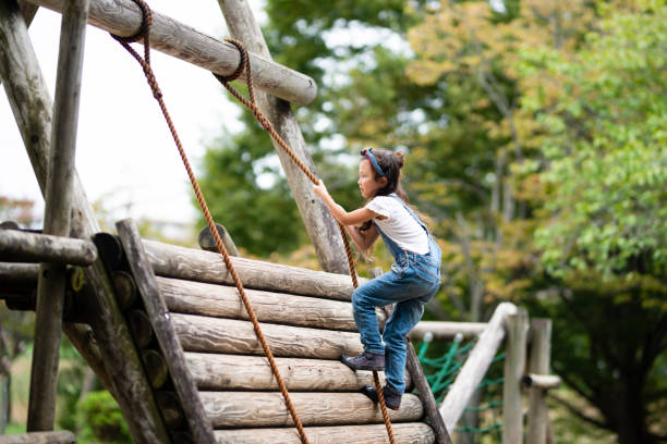 istock Girl playing in the park 1038152756