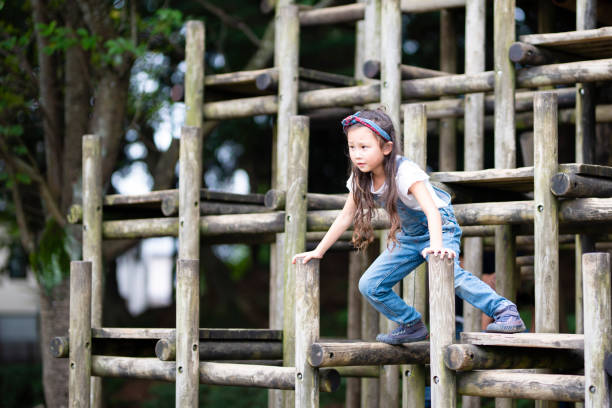 istock Girl playing in the park 1038152762