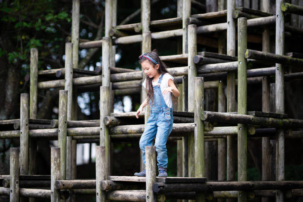 istock Girl playing in the park 1038152892