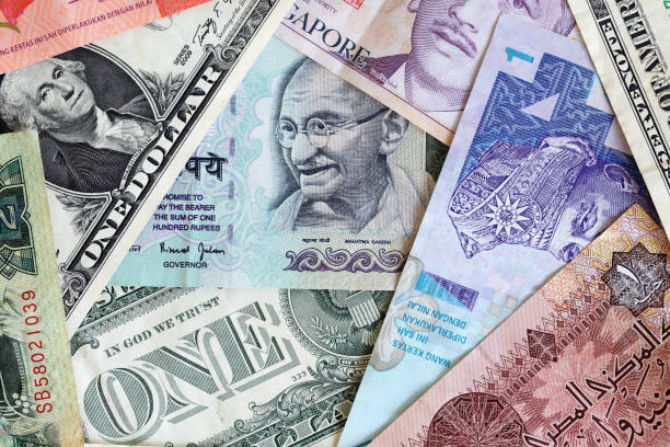 istock various international currency banknote background. 1038162370