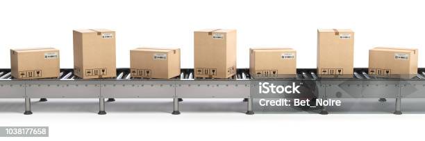 Ecommerce Delivery And Packaging Service Concept Cardboard Boxes On Conveyor Line Isolated On White Background Stock Photo - Download Image Now