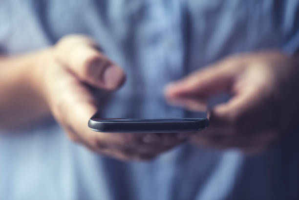 istock Woman hands holding a smartphone 1038182134
