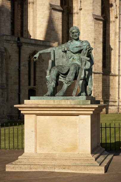 Bronze statue of Roman Emperor of Constantine the Great in front of York Minster YORK, YORKSHIRE, UK: JULY 22, 2008: Bronze state of Roman Emperor Constantine the Great in front of York Minster statue of emperor constantine york minster stock pictures, royalty-free photos & images