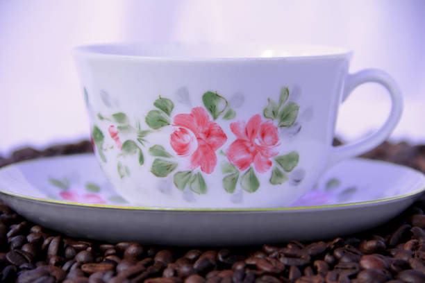 close up coffee cup on wooden table