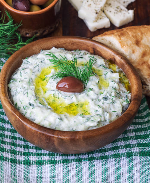 istock Tzatziki sauce in wooden bowl 1038258162