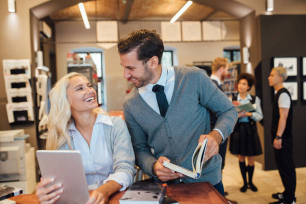 istock Couple studying at the library 1038269940