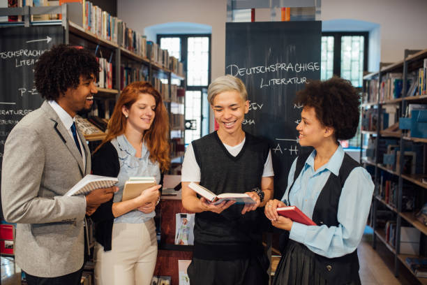 istock Group of students at the library 1038272322