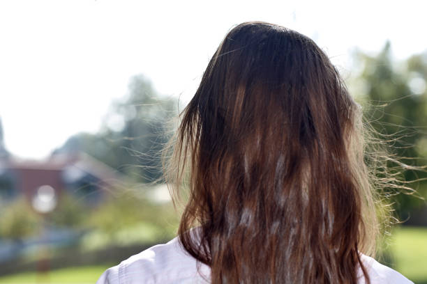 istock woman with bad hair 1038292464