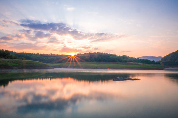 istock Forest, lake and sunrise 1038293058