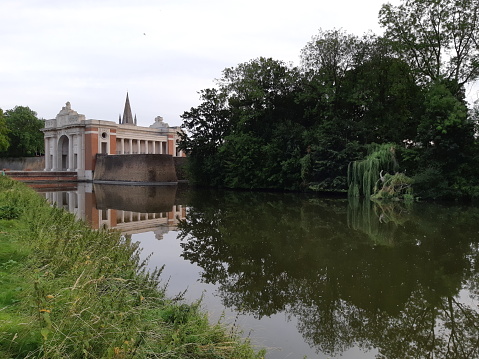 11th of August 2018: view on the Menin Gate in Ypres, Belgium, with water on the foreground
