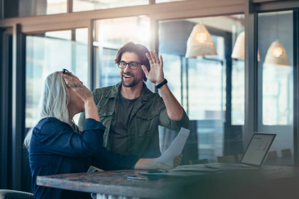 istock Business team rejoicing success 1038301234