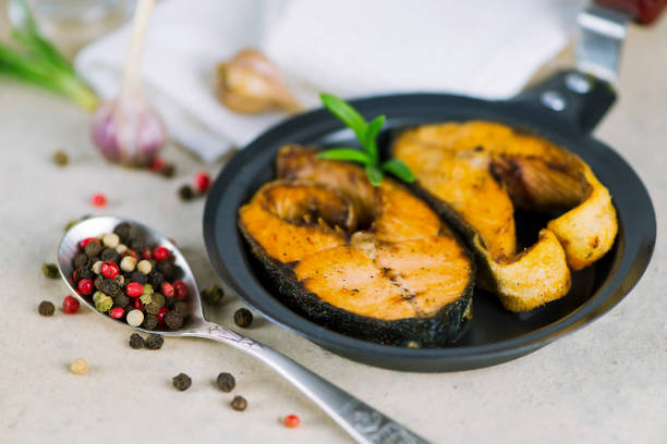 istock fried red salmon fish with spices 1038309004