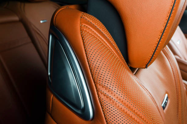 istock Car inside. Interior of a car. Comfortable leather seats. Perforated leather. Car interior details. Car detailing 1038317522