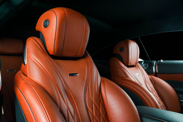 istock Car inside. Interior of a car. Comfortable leather seats. Perforated leather. Car interior details. Car detailing 1038317786