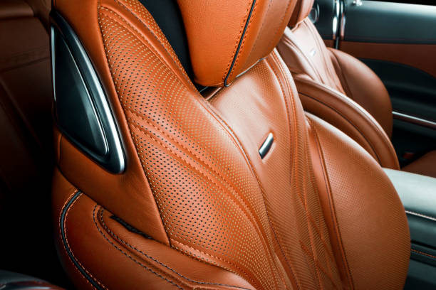 istock Car inside. Interior of a car. Comfortable leather seats. Perforated leather. Car interior details. Car detailing 1038317812