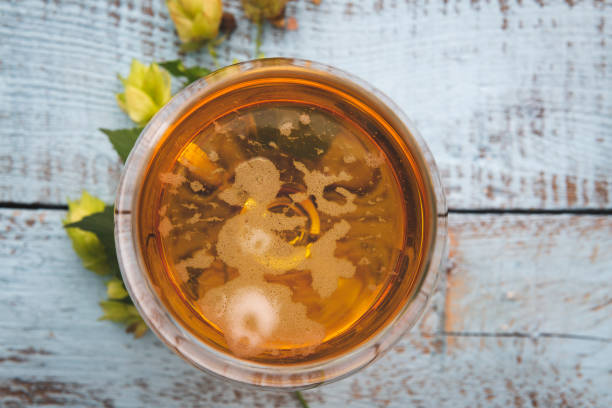 istock Beer on an old wooden table 1038323720