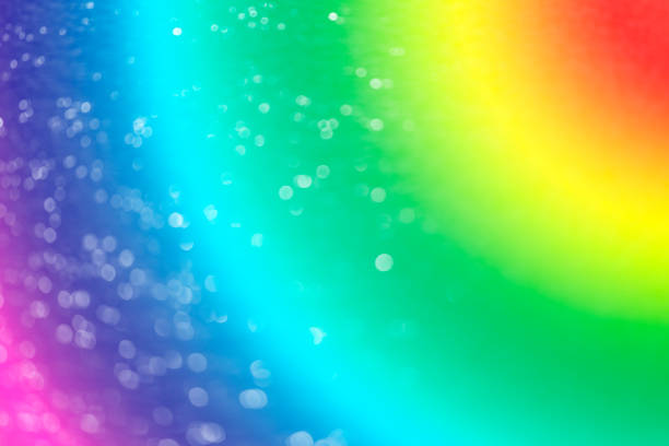 istock Rainbow color abstract background with soft light stars presented background of dream concept on sweet content. The rainbow color spread direction all around the picture make this background colorful. 1038326302