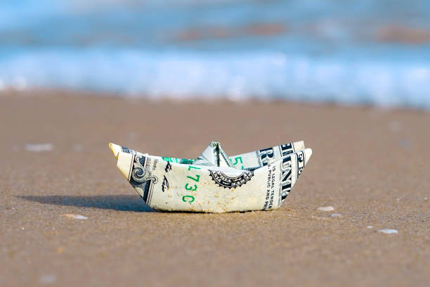 istock A boat made of paper money 1038336598