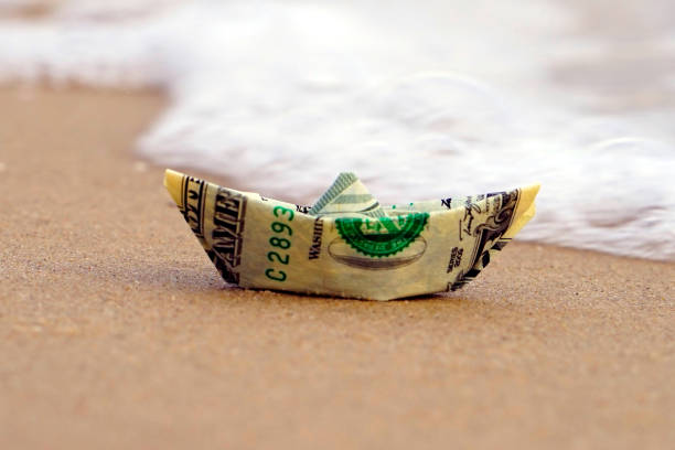 istock A boat made of paper money 1038336734
