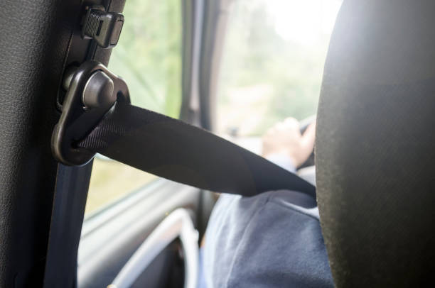 istock Driver man is fastened with a safety belt 1038361030