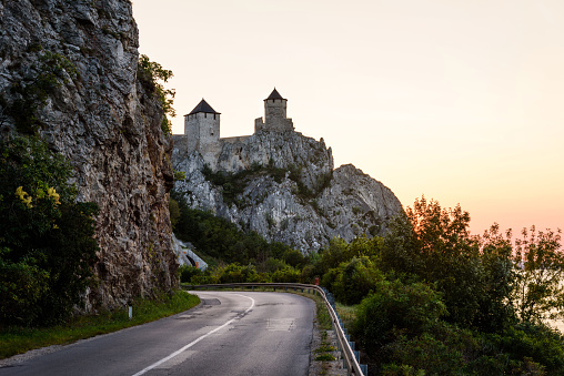 Medieval Golubac fortress and mountains by the road in Serbia