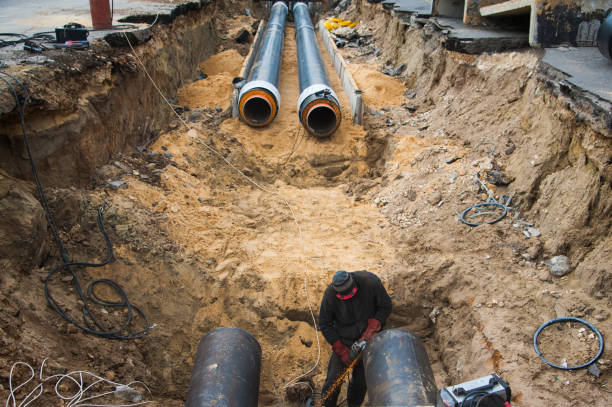 istock Laying new pipes in the trench 1038369108