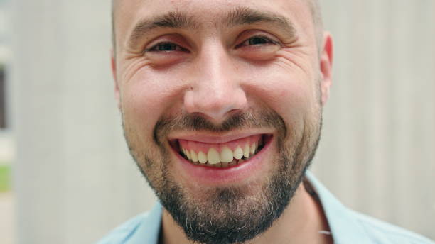 istock Close-up of Man with Beard Smiling 1038371994