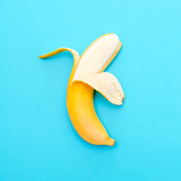 istock Yellow ripe banana peeled half 1038376538