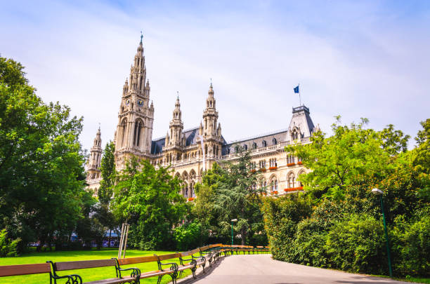 Facade of Vienna City Hall building Facade of Vienna City Hall building, view from picturesque green park. vienna town hall stock pictures, royalty-free photos & images
