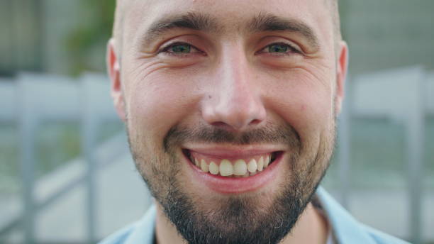 istock Happy Smiling Man with Beard in Town 1038389526