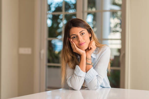 istock Young beautiful hispanic woman at home 1038393662