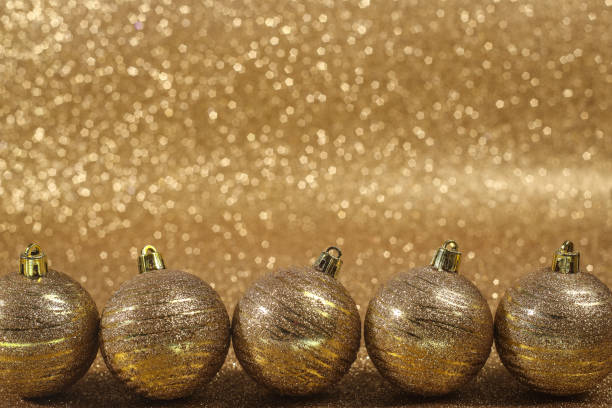 istock Christmas balls on gold glitters 1038402614
