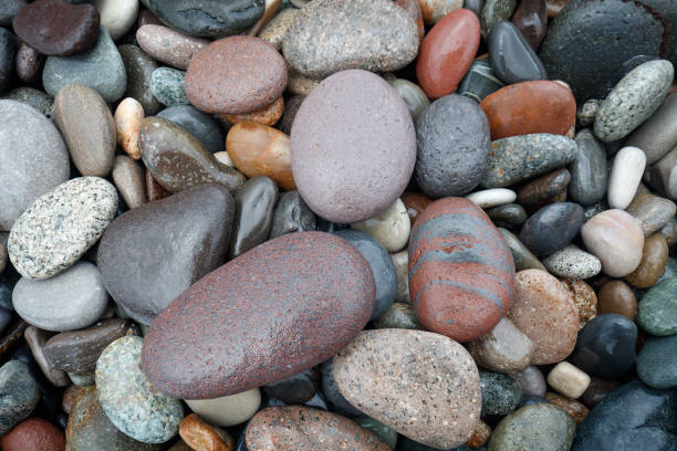 istock abstract background with round wet pebble stones 1038411280