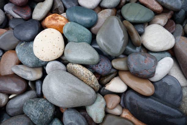 istock abstract background with round wet pebble stones 1038411388