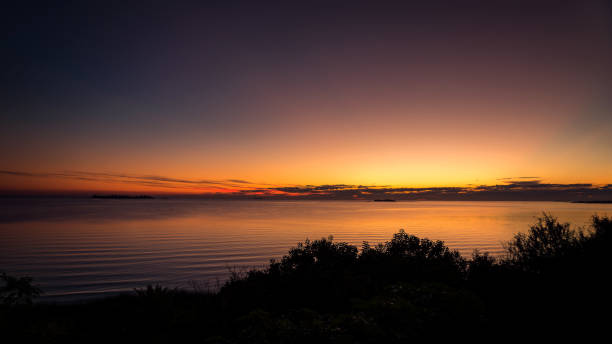 Sunset facing the Rio de La Plata in Colonia del Sacramento, Uruguay. stock photo