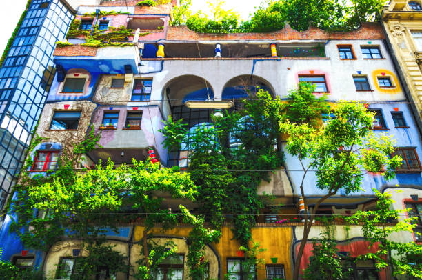Colorful houses on city street at sunny day Colorful houses on city street at sunny day. hundertwasser house stock pictures, royalty-free photos & images