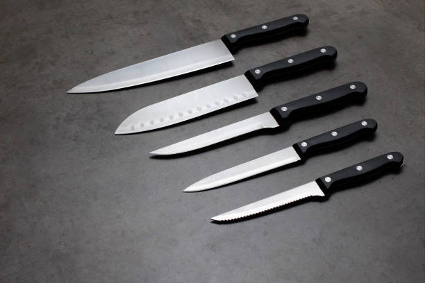 istock Knife set on a dark gray concrete table 1038469046