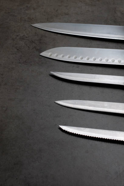istock Knife set on a dark gray concrete table 1038469456